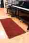 PianoCarpet ausgestellt in unserem Salon PianoCarpet bei STINGL in Rot